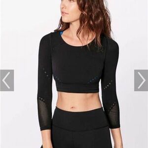 Lululemon Reveal cropped long sleeve Posy top.  Black.  Size 8.